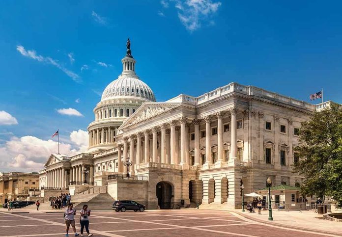 shutterstock_762608890 United States Capitol building with dome and columns under a blue sky