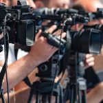 Arizona’s First Joint Ticket Upends Playbook television cameras on tripods at a media event