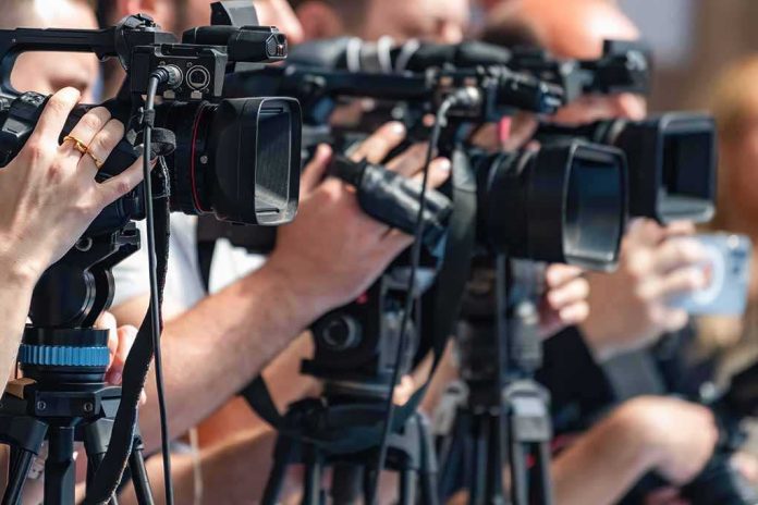 default-hero-07-1 television cameras on tripods at a media event