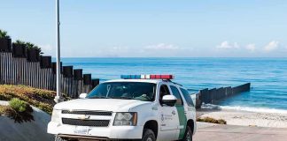 Deputies Swarm Kamala Harris’ Malibu Grounds Border patrol SUV parked near beach fence