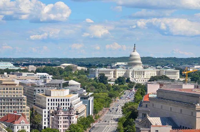 United States Capitol building with city street and skyline