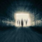 White House Pushes UFO Dump – What’s Inside? Silhouetted figures at the end of a dark tunnel