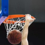 Fair-Play Stand Triggers Adidas Stampede Basketball player dunks ball through orange rim