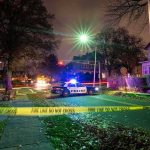 Campus Shock: Two Deaths, One Unanswered Clue Police car blocks residential street at night behind caution tape