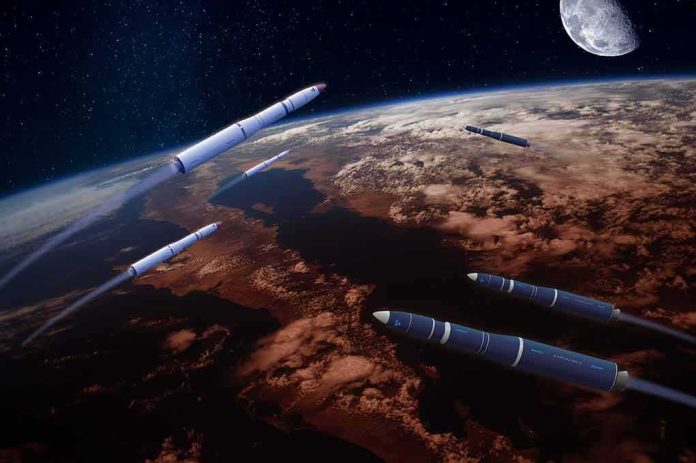 shutterstock_2060933069-1 Multiple rockets streak above Earth with the Moon in the background