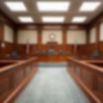 Judge Blames COVID—Baby Killer Walks Free Empty courtroom with wooden benches and judge's bench
