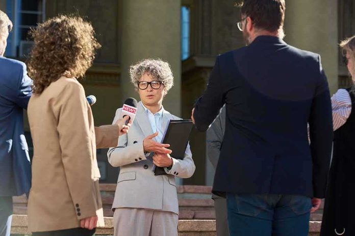Spokesperson addresses reporters on courthouse steps