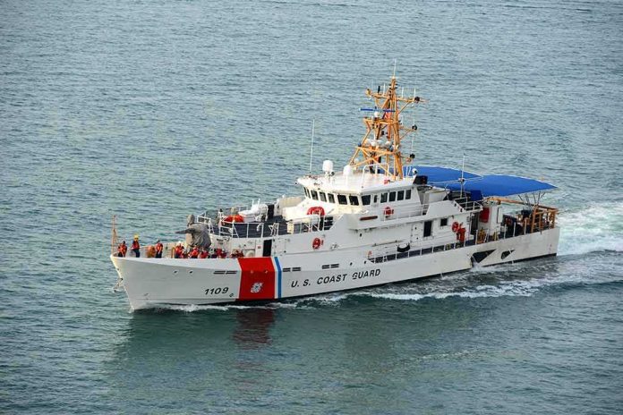 shutterstock_419363122 U.S. Coast Guard patrol boat cruising at sea