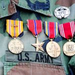 Mandatory Testosterone Tests Hit Troops Military uniform with service medals and ribbons