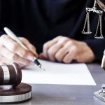 Deadlocked Jury, Explosive Warning From Dr. Phil Judge writing at desk with gavel and Lady Justice statue