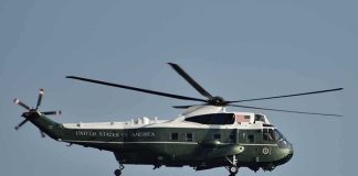 Trump Breaks Protocol On The Tarmac Green and white helicopter in flight