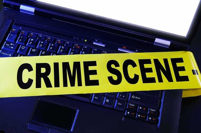 shutterstock_76567243 Laptop keyboard with yellow crime scene tape across it