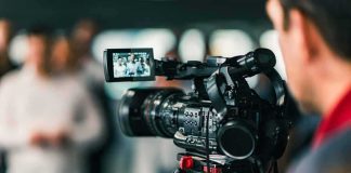 America’s First Execution Stream – Why Now? Video camera filming a group of people