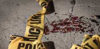 Marine Indicted: Hotel Horror in Okinawa Crime scene tape near blood on pavement