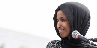 Rep. Ilhan Omar’s ‘Not To My Knowledge’ Sparks Uproar Ilhan Omar speaking at a microphone with hand on chest