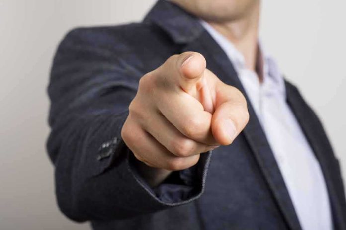 shutterstock_146536856 hand pointing directly at the camera