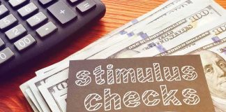 Obamacare Fees Boomerang – Cash Back? stimulus checks note on cash with calculator