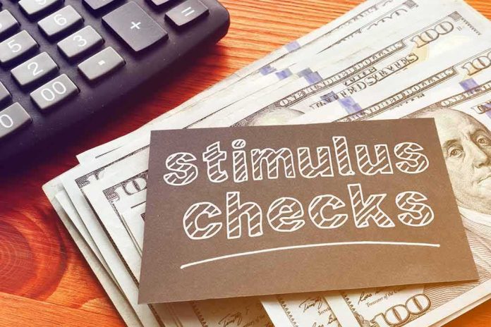 stimulus checks note on cash with calculator