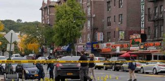 Unsealed Arrest Video Sparks Big Questions Police investigate a taped-off urban street crime scene