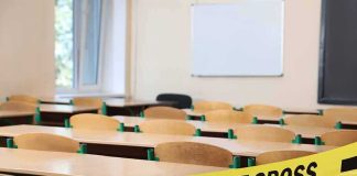 Dad Storms Classroom, Hear His Story Empty classroom with police tape across desks