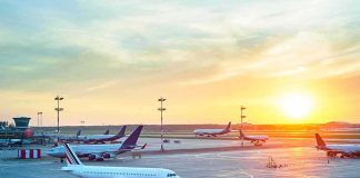 Missiles Slam Saudi Airports Airplanes on airport tarmac at sunset