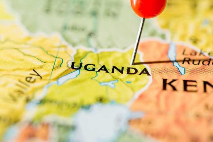 Map of Uganda with a red pushpin marking the location